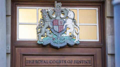 The crest of the Royal Courts of Justice where the High Court and the Court of Appeal sit in Belfast. 