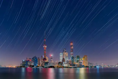 Daning Kai An image of stars over the Lujiazui City Skyline in China