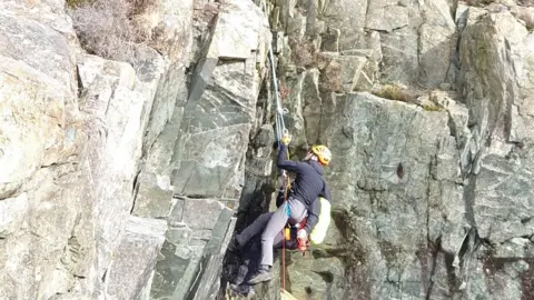 Llanberis Mountain Rescue Team Rescuer on the cliff