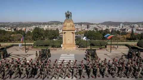 Members of the South African Military AFP arrive before the inauguration of South Africa's Cyril Ramaphosa as President at the Union Buildings in Pretoria on June 19, 2024.