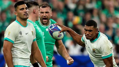 Damian de Allende and Damian Willemse show their disappointment during the World Cup match last September as Tadhg Beirne celebrates an Ireland turnover