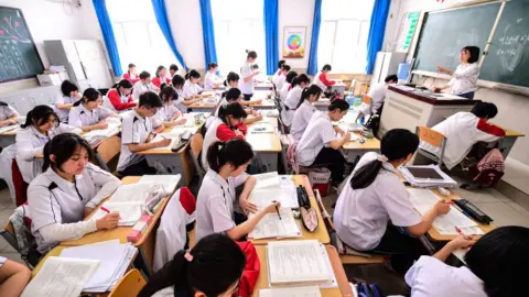 Getty Images Students study in the classroom for the upcoming national college entrance exam on May 19, 2022 in Shenyang, Liaoning Province of China.