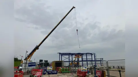 Lara King/BBC A steel frame being put in place for the new Cleethorpes lifeboat station