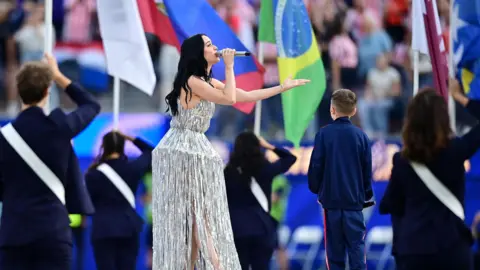 Singers Katy Perry and Tius Luka perform during the opening ceremony before the match IMAGN