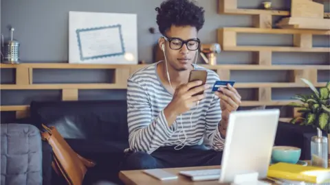 Getty Images young man buying products online