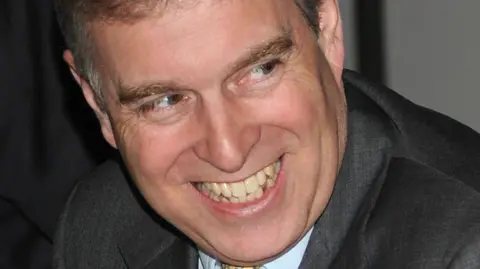 Prince Andrew in close up smiling in a photo from 2020