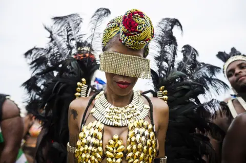 Canadian Press / Shutterstock Revellers take part in the Caribbean Carnival Grand Parade in Toronto