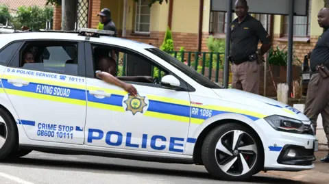 AFP via Getty Images Police car in South Africa - file image