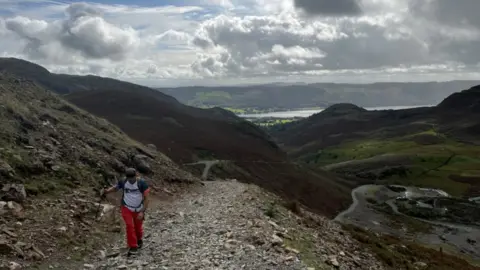 Anne-Marie Tasker/BBC Walker on the route to Wetherlam