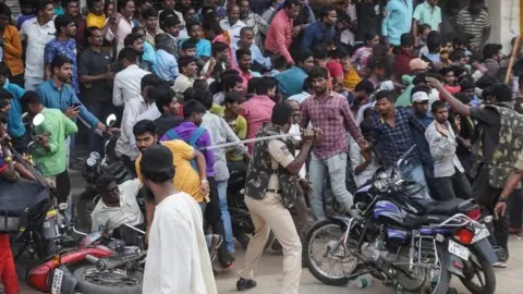 Reuters Police fight back protesters in Shadnagar