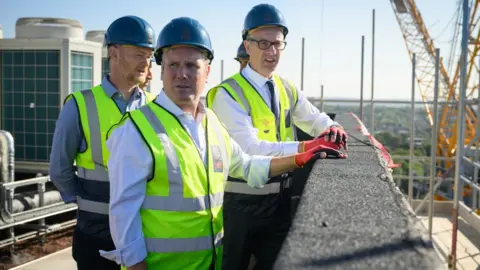 Getty Images Sir Keir Starmer visits a housing development in Walthamstow, London, in August 2022