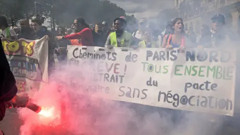 Getty Images Thousands of people take to the streets during the May Day demonstrations on 1 May 2018 in Paris, France.