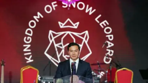 Getty Images Mr Aliyev campaigning for snow leopards