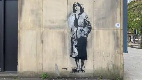 BBC A stenciled mural of Andrea Dunbar in Bradford city centre 