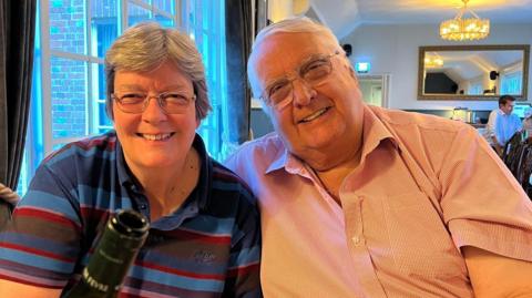 Di Hudson and husband Tony Hudson smile for the camera in the months before Tony had stroke. 
