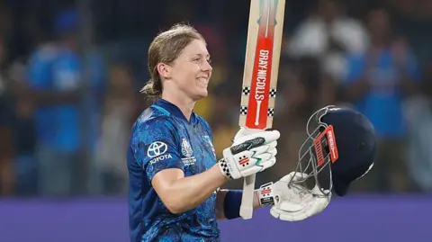 Heather Knight celebrates a century v India at the 2025 World Cup