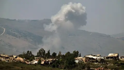 Smoke rises following an Israeli air strike in southern Lebanon, as seen from the Israeli side of the border (17 June 2026)