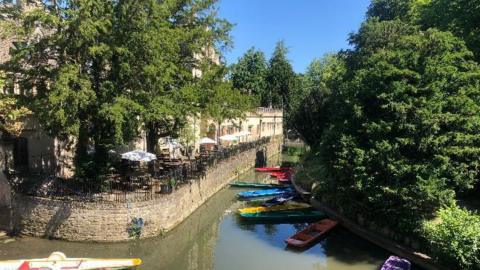 WEDNESDAY - A canal in Oxford containing several colourful boats lying empty