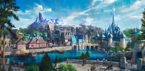 Disney An artist illustration of the World of Frozen area in Disneyland Paris Resort. It shows a glistening ice-topped palace set within a series of looming mountains. Traditional buildings line a lake, where boats are moored.