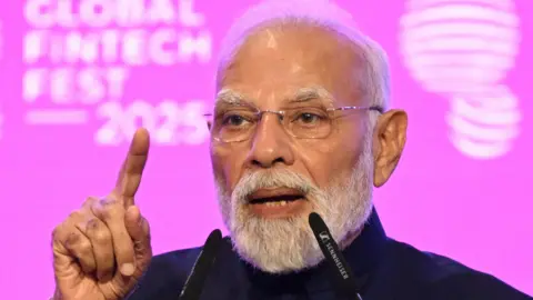 Reuters Indian Prime Minister Narendra Modi speaks at the Global Fintech Fest