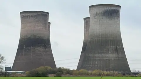 Four cooling towers