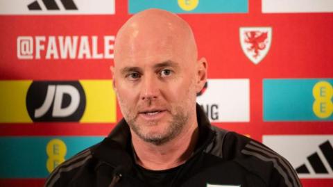 Rob Page speaks during a press conferencee