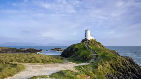 Getty Images A view of the old lighthouse at Llanddwyn Island, Anglesey