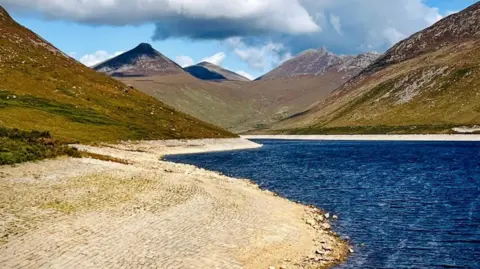 BBC Weather Watcher AlicelouiseP Silent Valley in Kilkeel. Green mountains and water is at a low level.