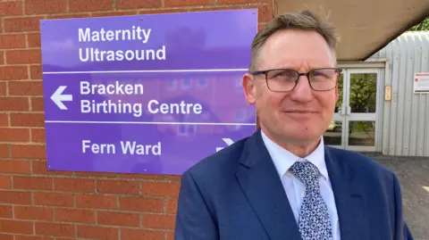 Peter Lewis outside Musgrove Park Hospital