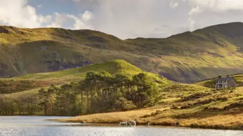 Getty Images Small farmstead below Cadair Idris