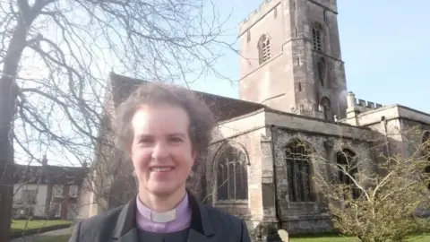 All Saints' Church Rev Rebecca Harris outside All Saints' Church