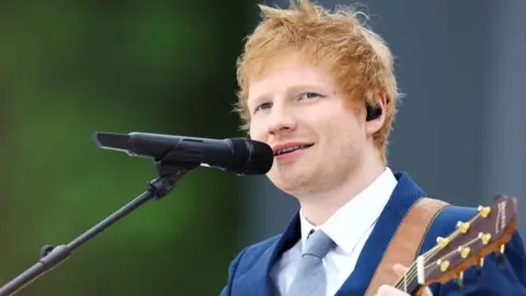 Getty Images Ed Sheeran singing