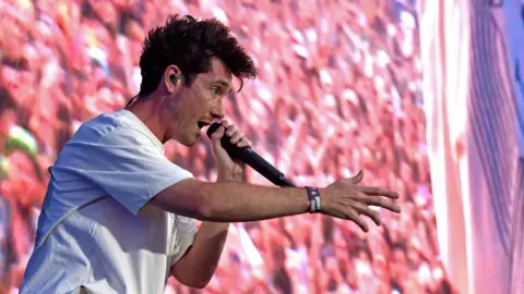 Getty Images Bastille's Dan Smith says the band have history with the double header Reading and Leeds festivals