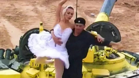 Tank and ballet dancer