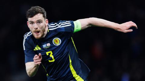 Andy Robertson playing for Scotland