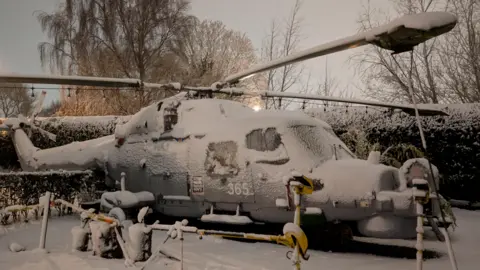 BBC Weather Watchers/Jonathan A helicopter covered in snow in Blackpool