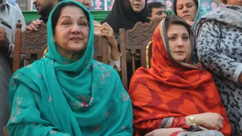 AFP Kulsoom Nawaz and Maryam Nawaz at an election meeting in Lahore in May 2013