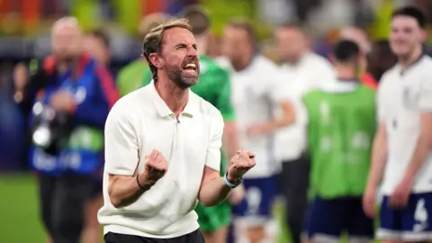 Getty Images Gareth Southgate celebrates England's Euro 2024 win over Holland in the semi-final 