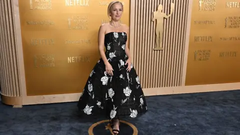 Getty Images Gillian Anderson arrives for the 31st Annual Screen Actors Guild awards at the Shrine Auditorium in Los Angeles, February 23, 2025