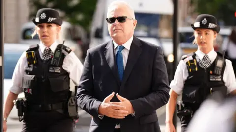 PA Media Former BBC broadcaster Huw Edwards arriving at Westminster Magistrates' Court, London, where he is charged with three counts of making indecent images of children following a Metropolitan Police investigation. The veteran broadcaster is accused of having had 37 photographs on WhatsApp, including six of the most serious type between December 2020 and April 2022