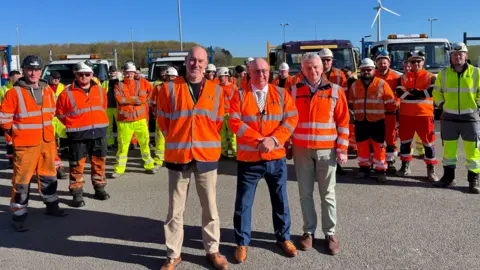 Mick Barton, Reform UK council leader, Nottinghamshire county council stood with Bert Bingham, cabinet member for transport and environment and David Langford, Director for highways, transport and waste management, Nottinghamshire county council