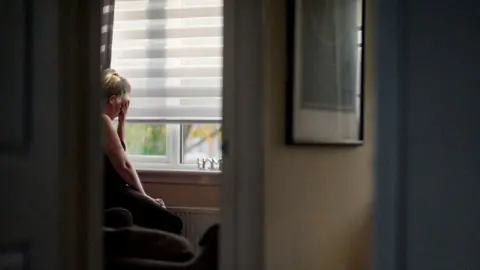 Blast Films Karen anxiously waits at home for news about her missing daughter, Larissa