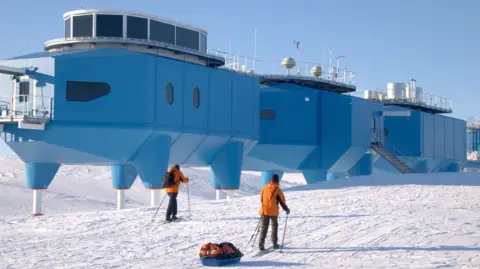 BAS Two members of staff skiing outside the Halley VI Research Station