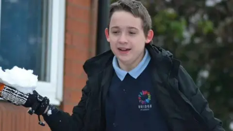 George Baldock George throwing a snowball at school