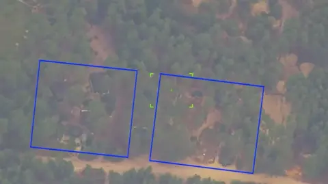 Two boxes show where Russia's missile purportedly hit a training unit in a wooded area