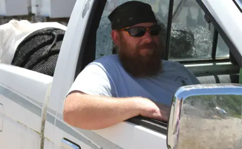 BBC Worker behind the wheel