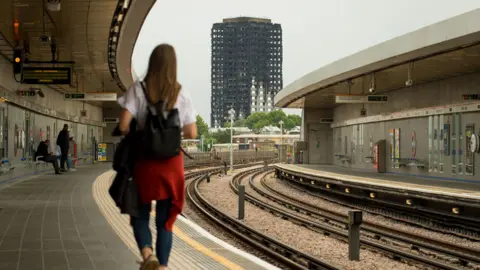 PA General view of the Grenfell Tower from Wood Lane station in west London. Photo taken 11 July