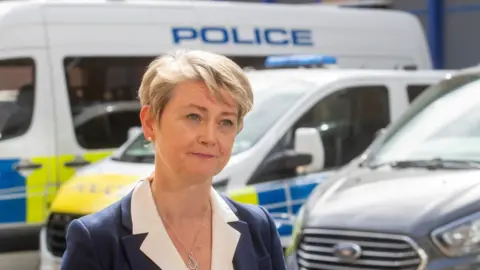 Reuters Home Secretary Yvette Cooper during a visit to Lewisham Police Station