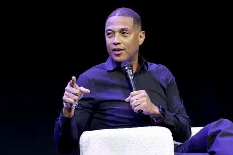 Don Lemon speaks on stage during a panel discussion in New York City in October