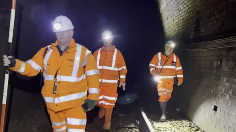 BBC Engineers in railway tunnel